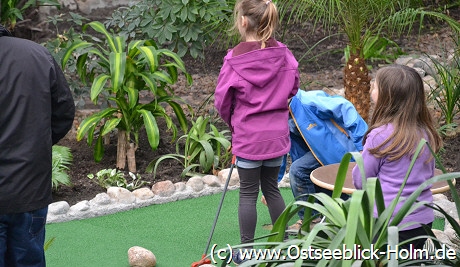 Golfspieler im Palmengarten